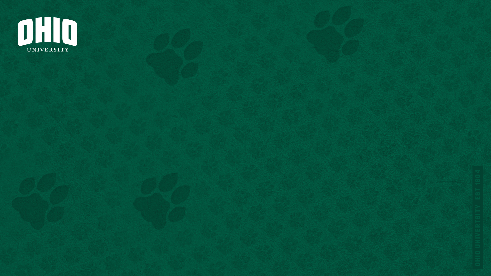 A textured green background with a repeating pawpring pattern